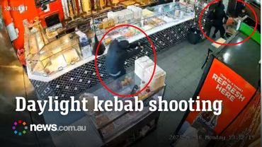 Moment two masked men storm a kebab shop captured on footage