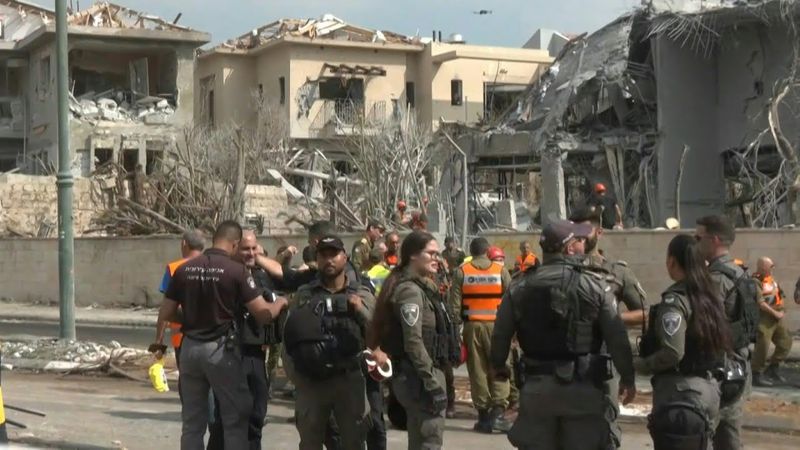 First responders assess damage in central Israel after new Iran missile attack | AFP