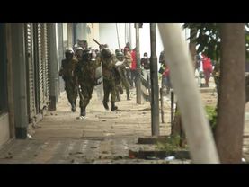 Kenyan protesters charge police as demonstrations turn violent | AFP