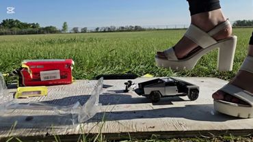 Pebbles crushes model Cypertruck #tesla #crushexperiment #modelcarcrush #highheels #asmrcrush