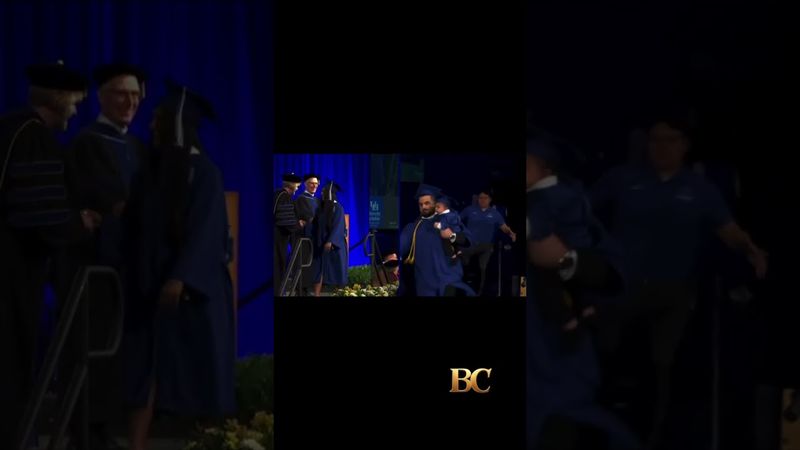 University of Buffalo grad chased by police as he runs across stage holding his baby