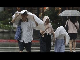 Thousands of people evacuated in Taiwan as Typhoon Podul makes landfall