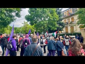 Protesters in Budapest demonstrate against 'Transparency Bill' with banner and red paint