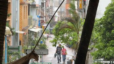 Heavy rain and strong winds lash Hong Kong as Typhoon Wipha hits | AFP