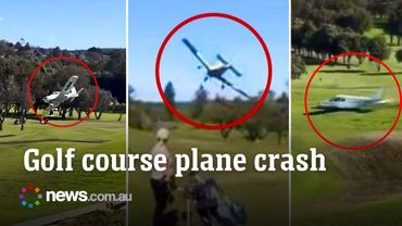 Moment plane crashes onto Sydney golf course