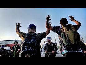 LA imposes downtown curfew as Newsom criticises Trump