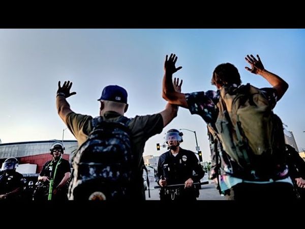 LA imposes downtown curfew as Newsom criticises Trump