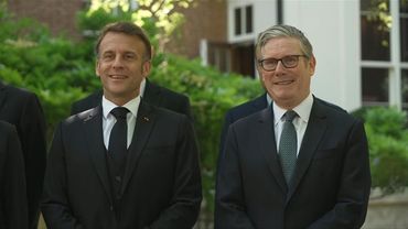 Macron and Starmer pose for photos at start of UK-France summit in London | AFP