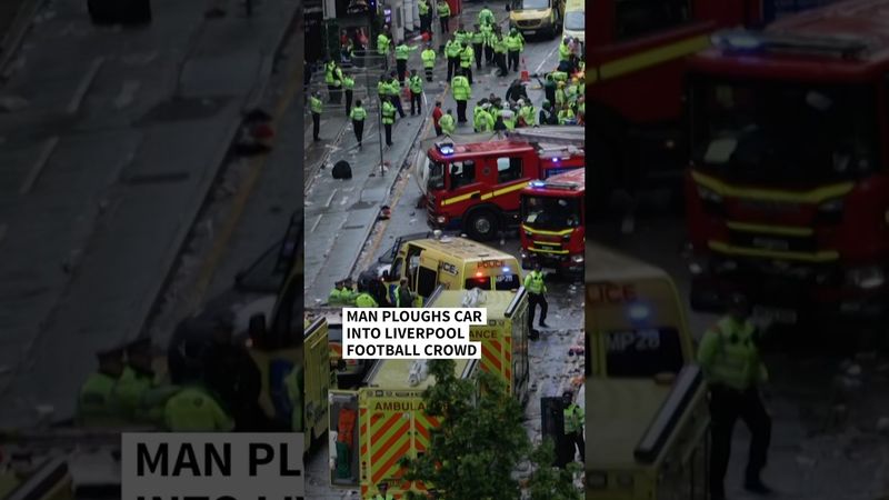Dozens injured after man ploughs car into Liverpool football crowd | AFP #shorts