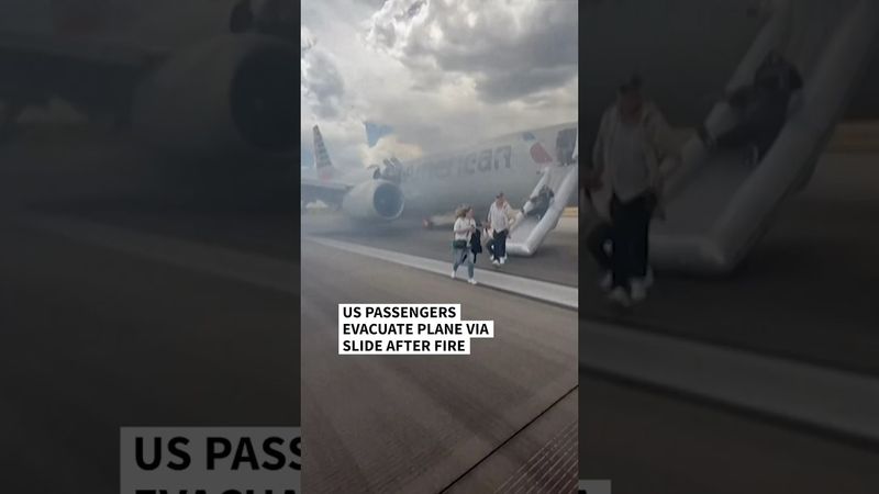 US passenger plane evacuated in Denver due to brake fire | AFP #shorts