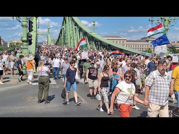 Thousands march in silence in Budapest to protest against 'transparency bill'