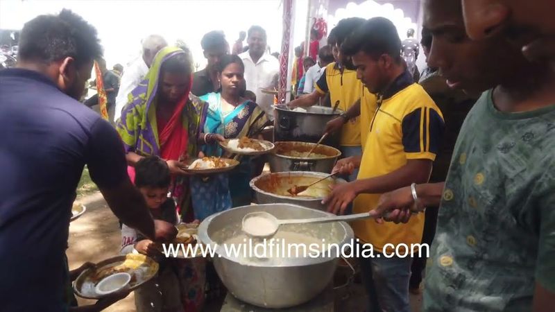 Food distribution in a village temple of Odisah