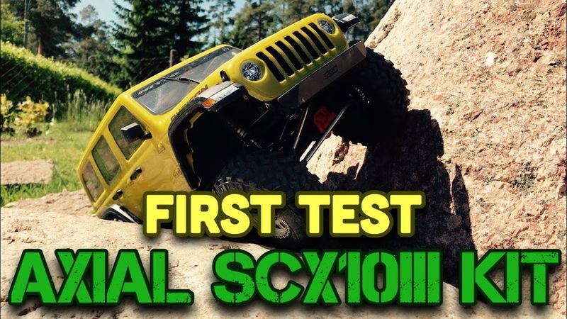 Stock Axial SCX10iii - First test on my new backyard track crawling rocks