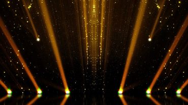 golden stage with spotlights and particle