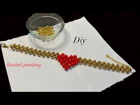 كيفية صنع هذا السوار الجميل على شكل قلب أحمر…❤️￼