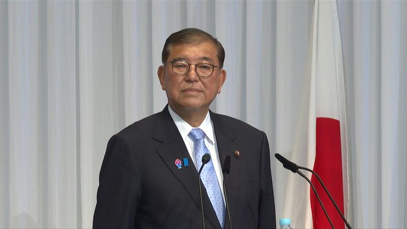 Japan PM hangs on after 'extremely regrettable' election | AFP
