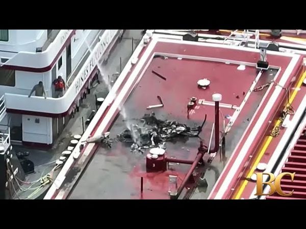 2 dead after helicopter crashes into Mississippi River barge