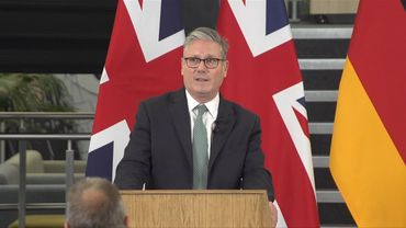 UK says Germany pledges help against people smuggling gangs | AFP