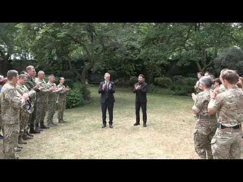 Zelensky and Starmer meet with Ukraine-bound troops at Downing Street | AFP
