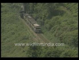 A coal engine train Nilgiri mountain railways, passengers are enjoying the blue mountains of Ooty.