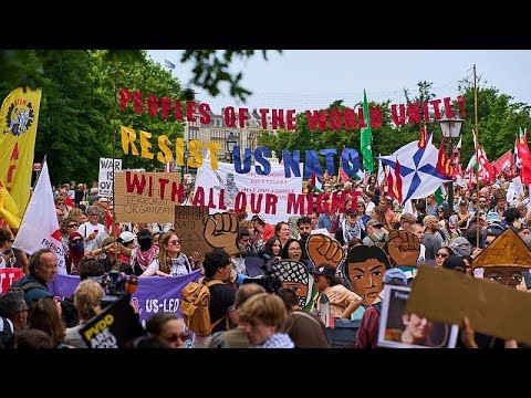 Hundreds take to the streets of the Hague in demonstration against NATO days before major summit
