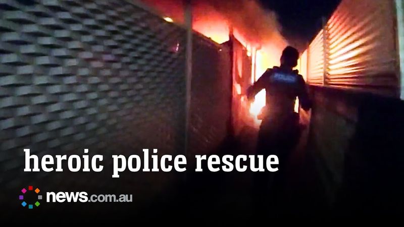 Cops race into  suspicious  Townsville fire in daring rescue